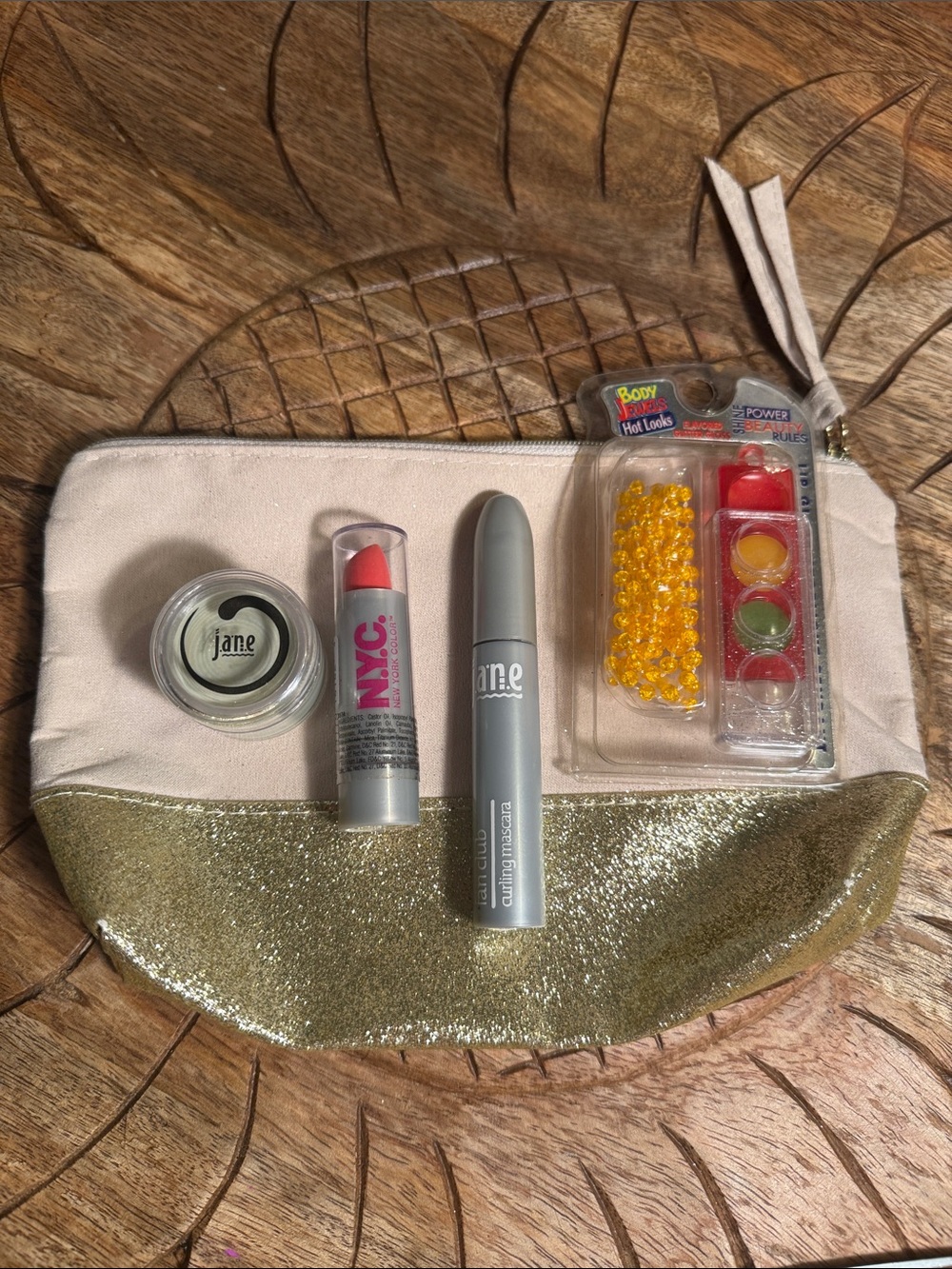 NWT Jane mascara with gold-accent glitter makeup pouch and assorted lipsticks